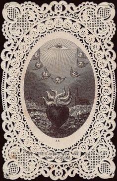 an old doily with the image of a heart surrounded by angels and birds on it