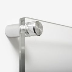 a close up of a metal object on a white surface with no people around it