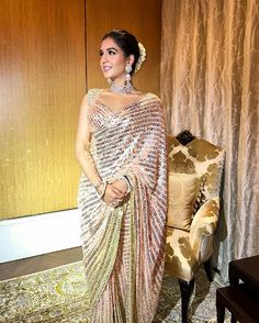 Beautiful Radhika Merchant @radhikamerchant looks mesmerizing in Ombré Metallic Saree Stunning Designer Saree: @manishmalhotraworld #saree #love #mmsaree #radhikamerchant #ambanifamily #ambanibahu #sequinsaree #sareeblouse #sareeblousedesigns #manishmalhotrasaree #designersaree #designersarees #nitaambani #anantambani #mukeshambani #anantambani #nitaambani #kokilabenambani #ambani #ambaniwedding #ambanifamily Radhika Merchant Outfits Wedding, Radhika Merchant Saree, Radhika Merchant Outfits, Meera Rajput, Sequence Sarees, Farewell Saree, Aesthetic Clicks, Festival Saree, Manish Malhotra Saree