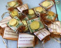 there are many small bags with gold coins in them