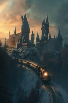 a train traveling past a castle on top of a snow covered hill in the evening