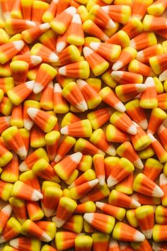 there are many candy corn on the table