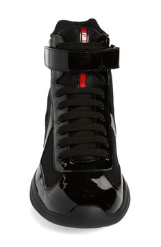 Prada creates a high-top version of its cult sneaker, which was originally designed for the Luna Rossa sailing team to wear during the 2000 America's Cup. It's crafted from a mix of patent leather and breathable mesh with a lightweight, flexible sole sporting the iconic red logo. Style Name:Prada America's Cup Bike High Top Sneaker (Men). Style Number: 6271519. Prada High Top Sneakers, Prada Trainers, Louis Vuitton Duffle Bag, Elegant Sneakers, Zanotti Sneakers, Prada Sneakers, Giuseppe Zanotti Sneakers, Nordstrom Shoes, America's Cup