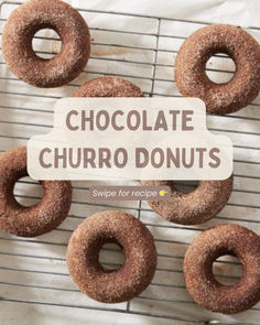 chocolate churro donuts on a cooling rack with the words, chocolate churro donuts