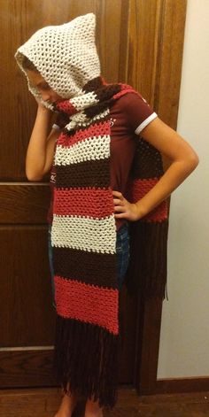 This hand crocheted hooded scarf was inspired by a 1974 magazine photo.  It is a super fashionable and practical too! Crochet Hooded Scarf, New Star Trek, Xena Warrior Princess, Xena Warrior, Hooded Scarf, Warrior Princess, Snap Backs, Hand Crochet, Photo Magazine