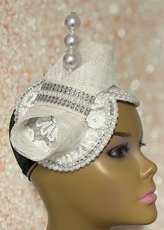 Simple, yet elegant. White Sinamay flower lace Fascinator half hat trimmed with pearls, rhinestones, and bow. The hat is affixed to the head via a hatstring. The hat measures approximately 9.5 inches X 5 inches. PLEASE NOTE All items for Free Shipping will be shipped via USPS First Class Mail.Gifts for mom, sister, wife, or yourself. Gatsby Style Fitted Fascinator Hat, Gatsby Style Fitted Headband Fascinator, Elegant Fitted Bridal Accessories For Party, White Fitted Fascinator For Ceremony, Fitted White Fascinator For Ceremony, Elegant White Adjustable Top Hat, Fitted Costume Hat With Pinched Crown For Church, Fitted Gatsby Mini Hats For Church, Adjustable Gatsby Style Headpieces For Church