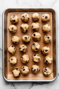 chocolate chip cookies on a baking sheet ready to go into the oven for bake