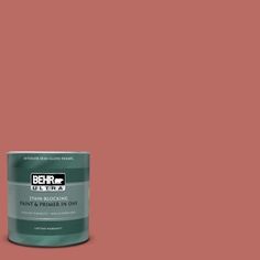 the behr paint is light beige and has a green tint with white lettering on it