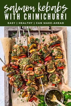 grilled shrimp skewers with chimichurri on a tray