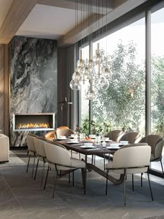 a dining room table with chairs and a fire place