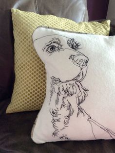 a pillow with a drawing of a dog on it