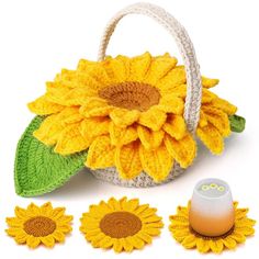 a crocheted sunflower sits next to an egg