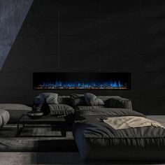 a living room filled with furniture and a fire place in the middle of it's wall