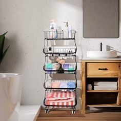 a bathroom with a sink, mirror and shelf next to the bathtub filled with toiletries