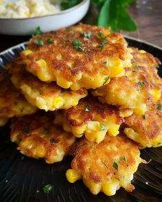 some corn cakes are stacked on top of each other