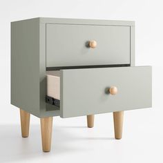 two drawers with wooden legs and knobs on each side, one drawer open to show an item