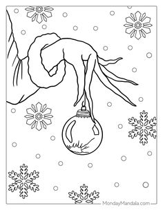 a black and white drawing of a woman hanging upside down on a christmas ornament