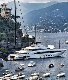 a large white boat floating on top of a body of water