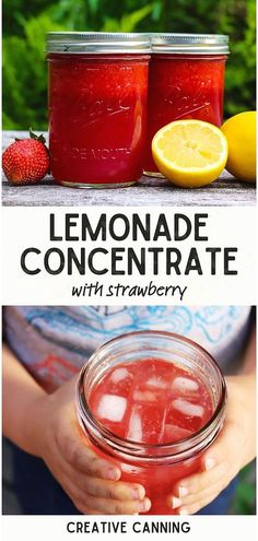 lemonade concentrate with strawberries in mason jars and on the table is a hand holding a