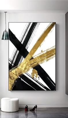 an abstract painting hangs on the wall above a radiator in a modern living room