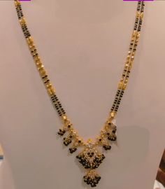 #blackbeads #short #916gold #nallapusalu #fashion #Latestdesign #gold #kdm #mangalsutracollection  #mangalsutra Long Black Beads Mangalsutra Designs Gold, Long Nallapusalu Designs Gold, Short Nallapusalu Designs Gold, Gold Black Beads Mangalsutra, Long Black Beads Mangalsutra Designs, Nallapusalu Designs Gold Long, Nallapusalu Designs Gold Short, Short Nallapusalu, Gold Earrings With Price