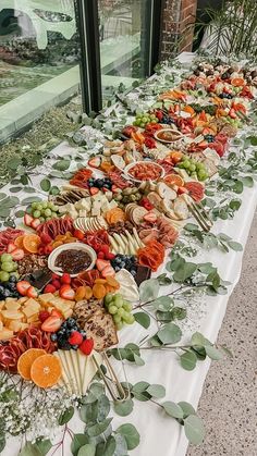 a long table filled with lots of different types of food