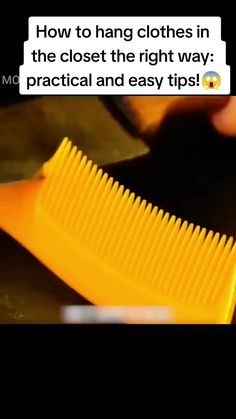 a yellow comb is being held by someone's hand with the caption how to hang clothes in the closet the right way practical and easy tips