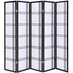 a black and white room divider with four panels on each side, one panel is open