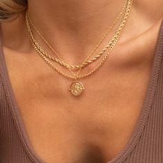 The necklace we’d wear on a summer vacay to Rio. This shimmery rope chain is sturdy and luxe. Pair your stack with a white button up for the easiest look ever. 18k gold plated stainless steel Psst: This piece utilizes durable stainless steel that's tarnish/water resistant - feel free to wear it 24/7! Thickness: 3 mm Length: 16" Necklaces Beads, Looks Country, Stacked Necklaces, White Button Up, Gold Necklace Layered, Rope Necklace, Girly Jewelry, 가을 패션, Coin Pendant