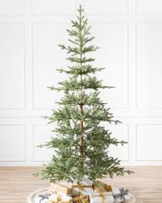 a small christmas tree sitting on top of a tray