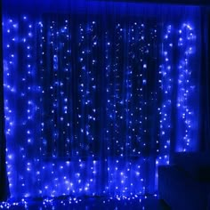 the curtains are covered in blue lights