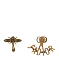 This is an authentic CHRISTIAN DIOR Metal J'Adior Earrings in Aged Gold. These asymmetric earrings feature an aged gold bee on one earring and a CD logo with "J'Adior" suspended beneath on the opposite earring. Asymmetric Earrings, Dior Earrings, One Earring, Dior Jewelry, Gold Bee, Christian Dior, Cd, Dior, Bee