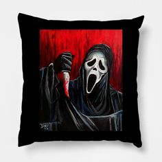 a pillow with a painting of a person wearing a mask and holding a knife