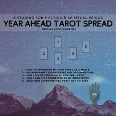 a hand reaching up to the sky with text over it that reads year ahead tarot spread