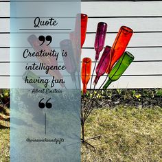 there is a sign that says, quote creativity is intilince having fun almost often