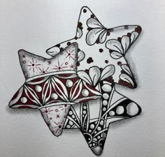 a drawing of three stars with different designs on the bottom one is red, white and black