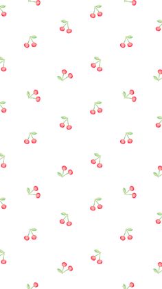 a white background with cherries and green leaves