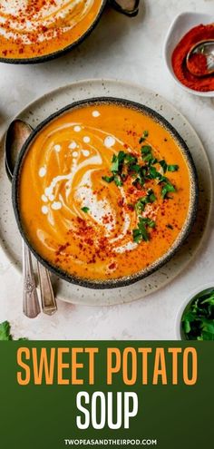 two bowls filled with sweet potato soup on top of a table