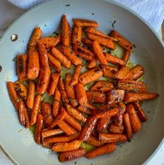 cooked carrots in a pan on a table