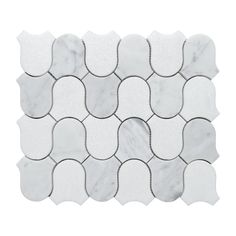 a white marble mosaic tile with wavy shapes