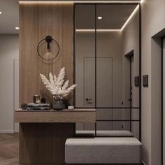 a modern bathroom with wood paneling and white flowers in the vase on the counter