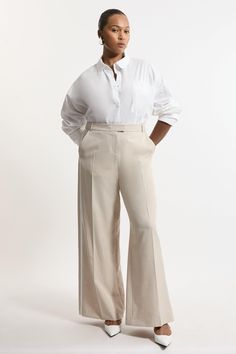 With A Fit That Flatters The Curves, These Plus Size Trousers Are Certain To Turn Heads. Contrasting Tipped Detailing Adorns The Whole Piece, And The High Waistline And Straight Leg Fit Make For A Universally Flattering Fit. Style This Piece With The Matching Blazer Or A T-Shirt And Strappy Heels For An Occasion Look Perfect For Parties And Evenings Out. Plus Size Straight Leg Tipped Tailored Trousers Comfortable, High Waistline Unique, Tipped Detailing Flattering, Straight Leg Fit Button Front