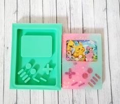 two plastic trays with various items in them