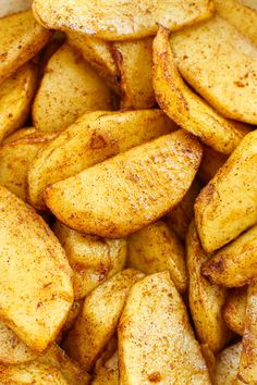 some fried potatoes are in a white bowl