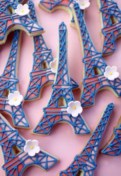 decorated cookies in the shape of the eiffel tower