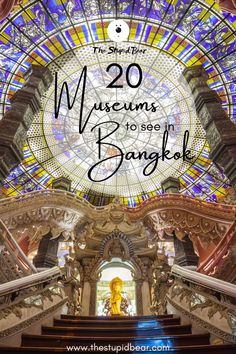 the inside of a building with stained glass windows and stairs in front of it, that reads