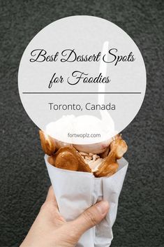 a person holding a paper bag with food in it and the words best dessert spots for foods