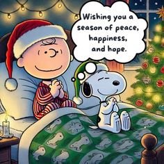 a charlie brown christmas card saying wishing you a season of peace, happiness and hope