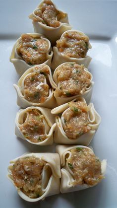 some food that is sitting on a white plate