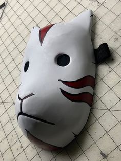 What we have here is a vacuum formed animal ninja mask for cosplay. It is wearable and adjustable straps to kids to adults.  The measurements are  7" wide by 9.5" tall (not including the ear hight) The build process  https://www.youtube.com/watch?v=VH2QVvbdA8E Full Face Masks And Prosthetics For Cosplay Events, Rave Masks For Cosplay Events, Rave Style Masks For Cosplay Events, Adjustable Masks For Halloween Cosplay, White Mask Costume Accessories For Cosplay, Themed Cosplay Eye Mask, White Mask For Cosplay, Rave Style Mask For Cosplay, Themed Eye Mask For Cosplay